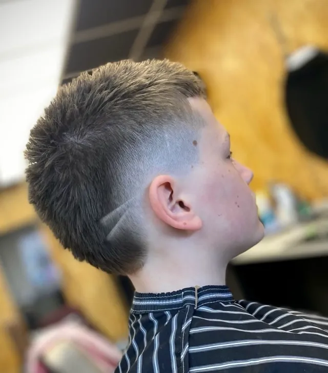 A young lad's tidy skin fade