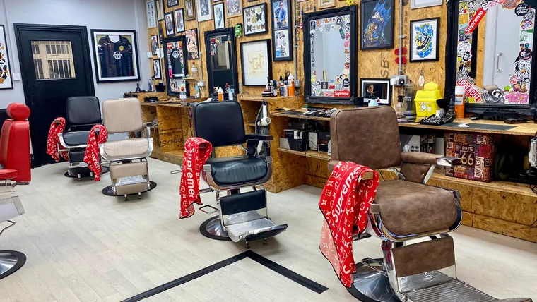 Inside Black Dog Barbershop — the barber stations and mirrors